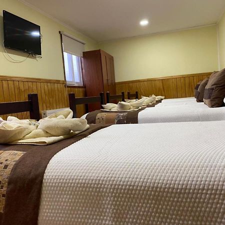 Hostal America En Puerto Natales Bagian luar foto