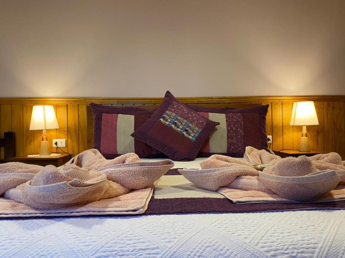 Hostal America En Puerto Natales Bagian luar foto