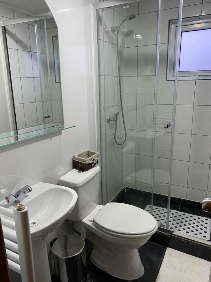 Hostal America En Puerto Natales Bagian luar foto